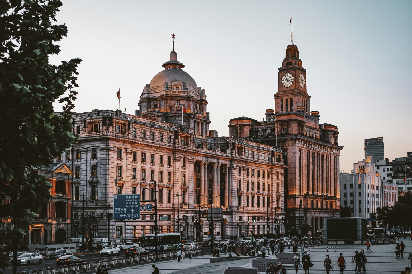 The former HSBC Building and Customs House clock tower on the Bund at dusk